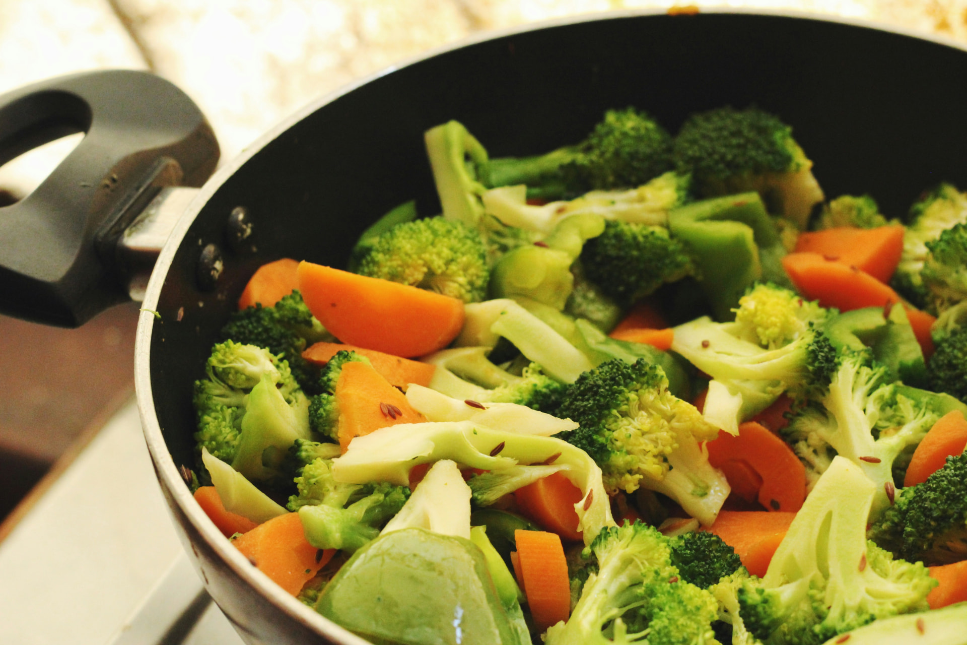 Fresh vegetables cooking in a pan