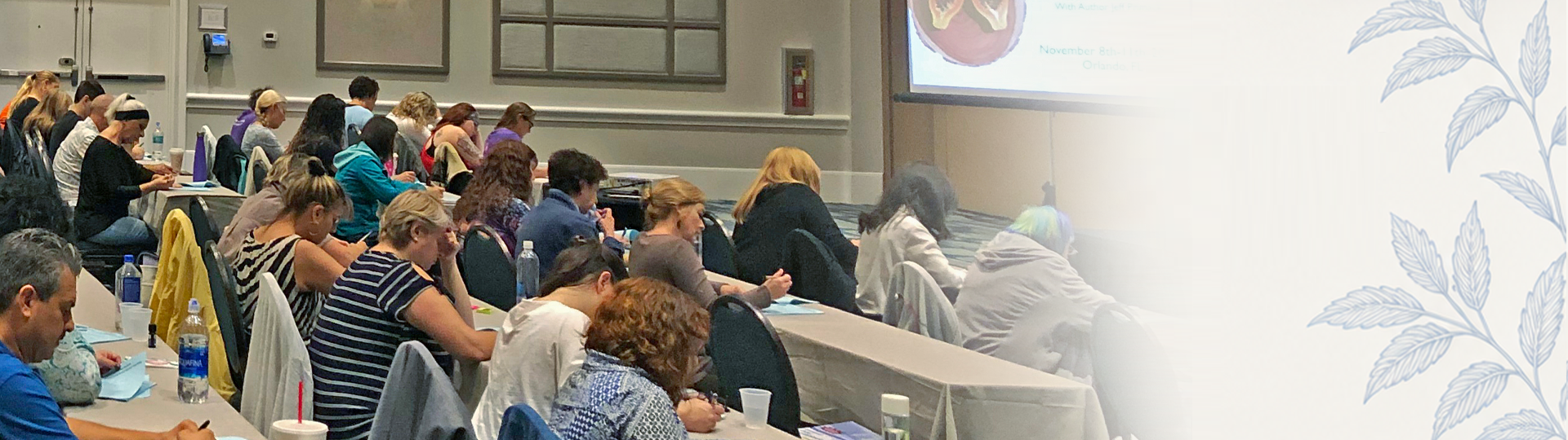 Students taking notes at a Jeff Primack food-healing seminar